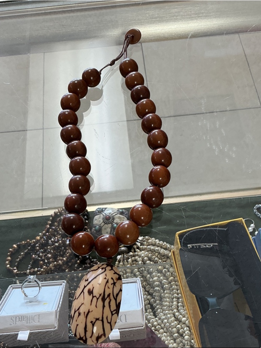 Brown Beaded Statement Necklace with Carved Pendant